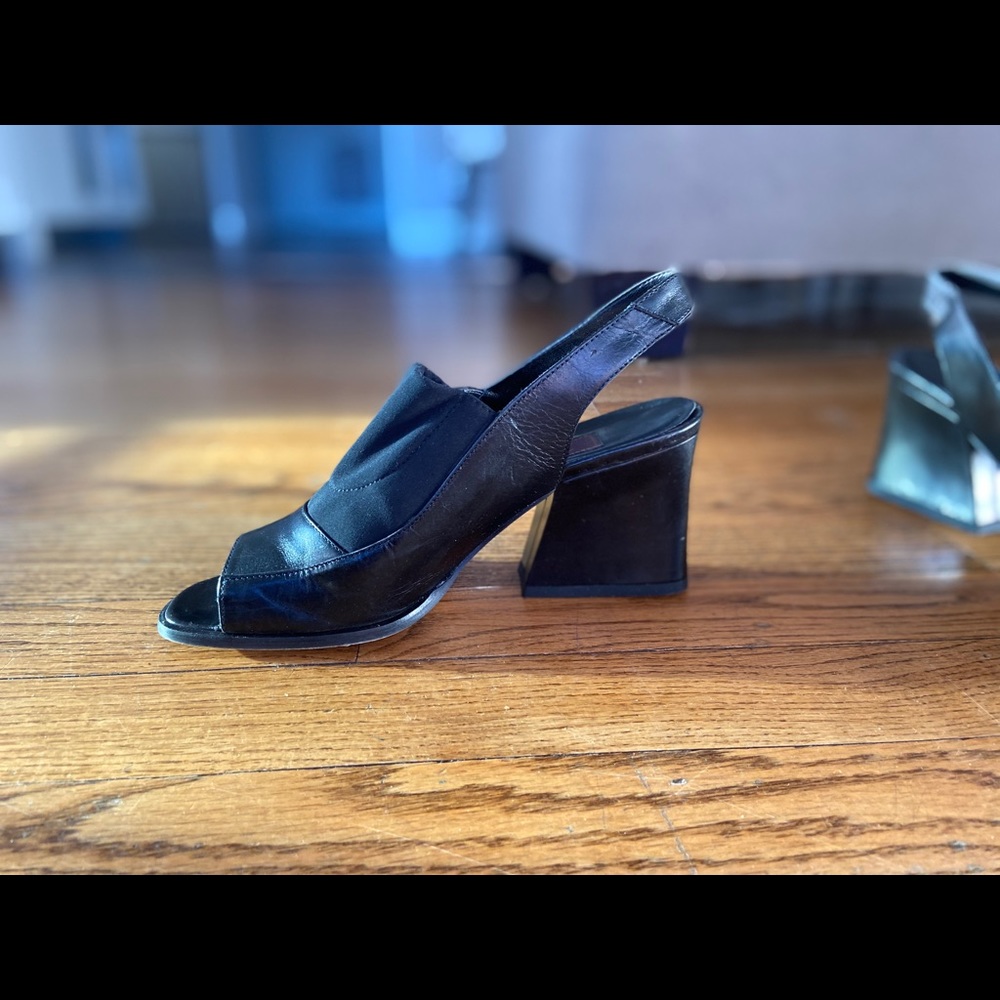 Italian made leather wedge heels. back strap, open toe. Sexy, stylish!